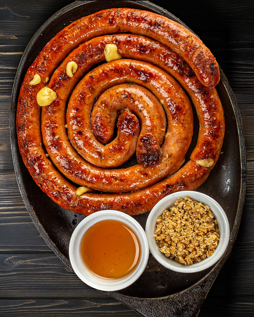 Fotografia gastronômica de linguiça artesanal
